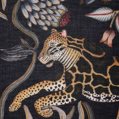 A focused shot showcasing the intricate animal motifs, blending golden hues with deep black and earthy tones for a sophisticated aesthetic.