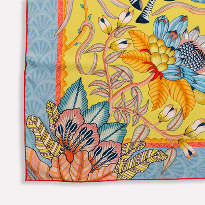 A portion of the scarf emphasising vibrant floral designs and flowing shapes that add movement to the composition.