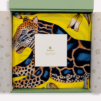 The scarf neatly placed inside a premium packaging box, with a portion of the design visible, accompanied by Ardmore’s signature branding.