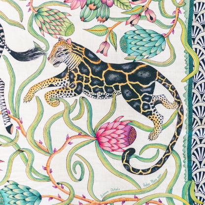 A detailed view of a zebra among lush protea vines, highlighting the organic shapes and rich detailing.