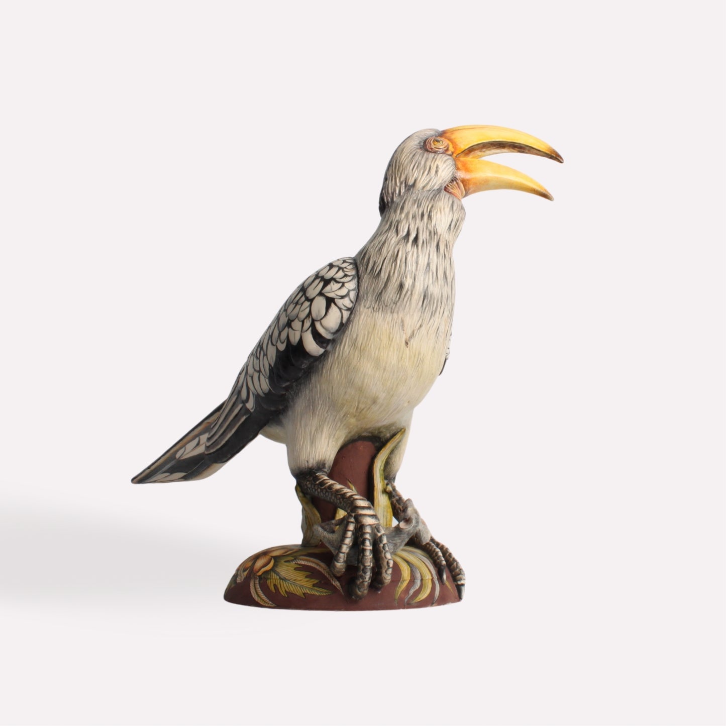 Another angled perspective of the hornbill sculpture, emphasising the craftsmanship, hand-painted textures, and lifelike pose.