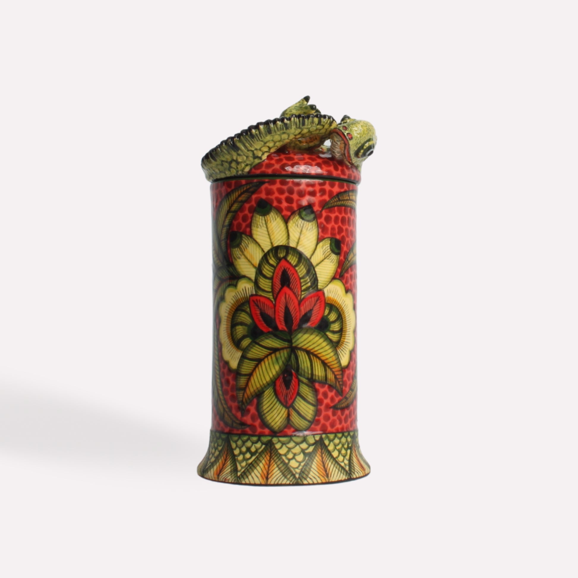 A three-quarter perspective of the pot, emphasizing its vibrant colour scheme and artistic craftsmanship.