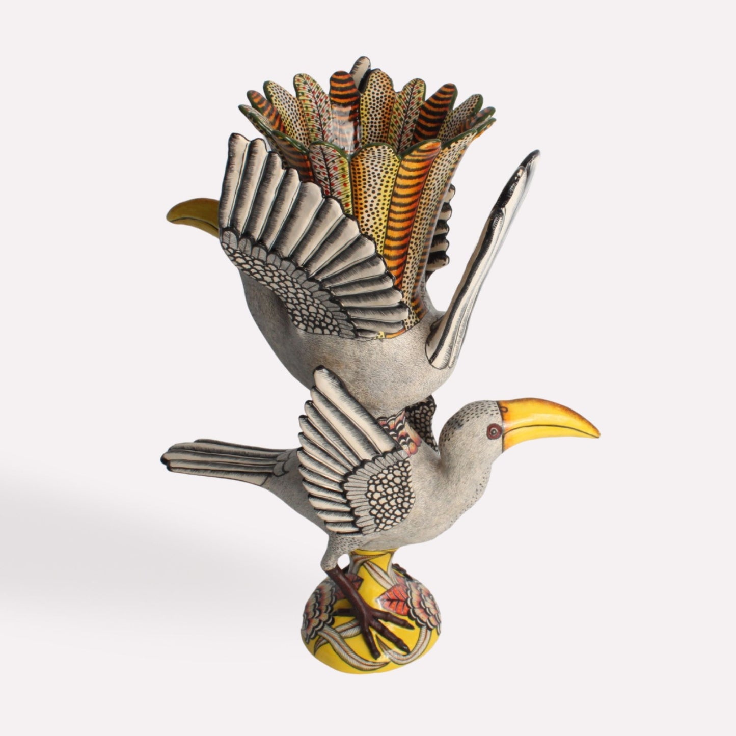 A back view of the vase, highlighting the detailed feather pattern on the bird’s wings and tail, along with the subtle color gradients that bring the piece to life.