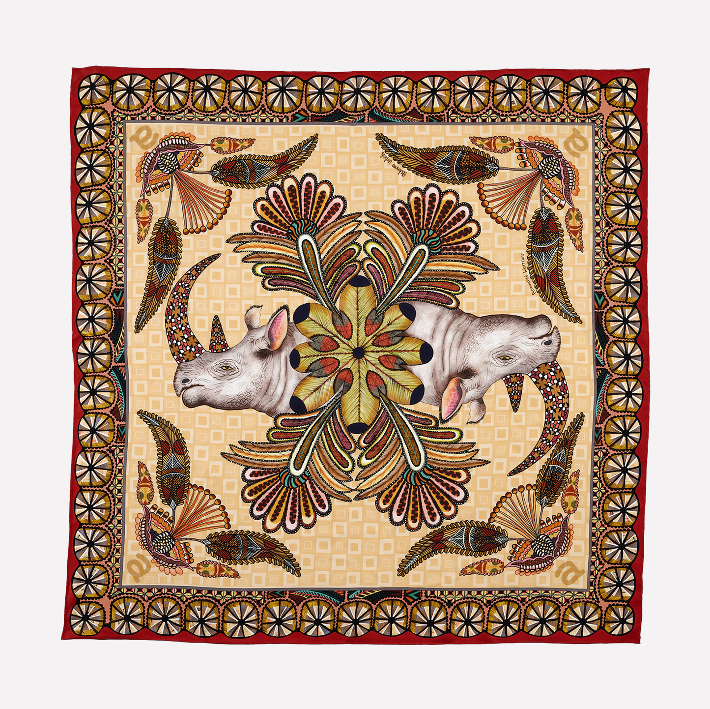 A square silk scarf featuring two mirrored rhinos with ornately patterned horns, surrounded by intricate Zulu-inspired motifs and a rich, earthy colour palette.