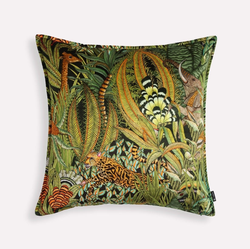 60x60cm cushion cover in Sabie Forest Delta fabric, featuring a vibrant double-sided velvet print of tropical foliage with shades of green, orange, and gold, finished with a top stitch.